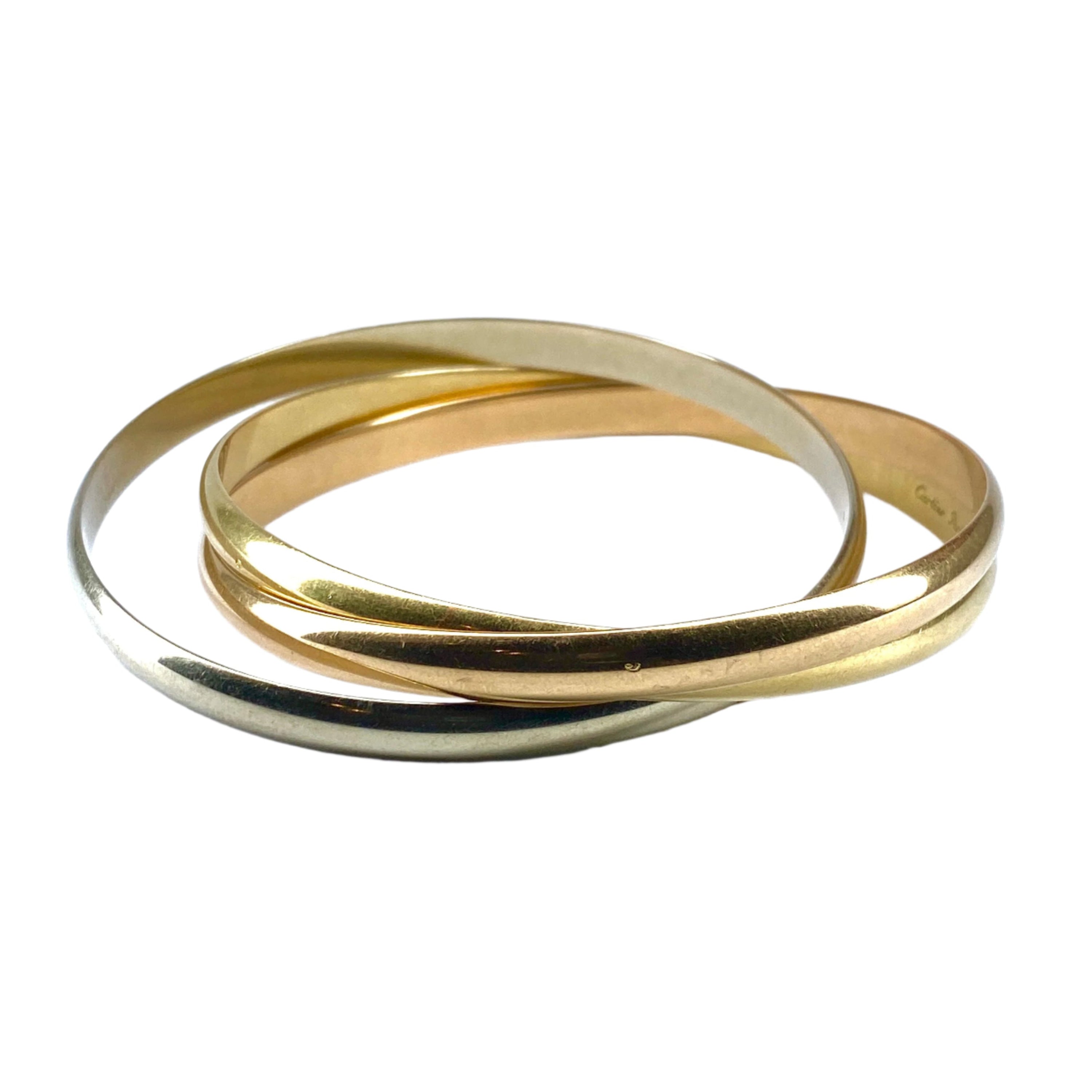 CARTIER “Trinity” bangle bracelet in yellow, white and rose gold