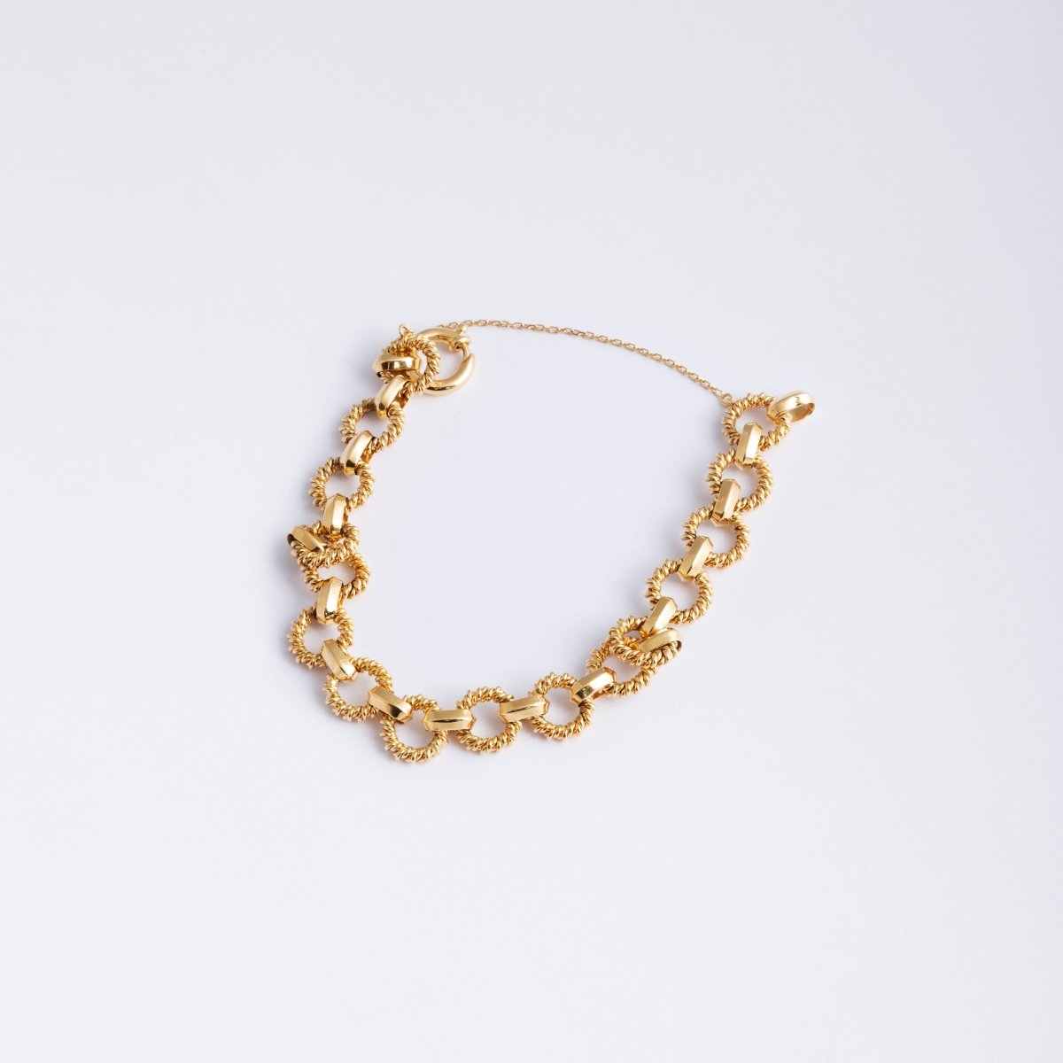 Bracelet BOUCHERON en or jaune composé d'anneaux godronnés - Castafiore
