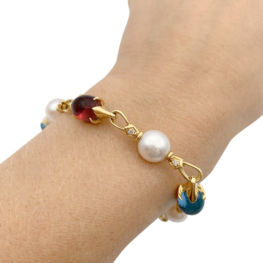 Bracelet Bulgari en or jaune, perles, pierres de couleur. - Castafiore