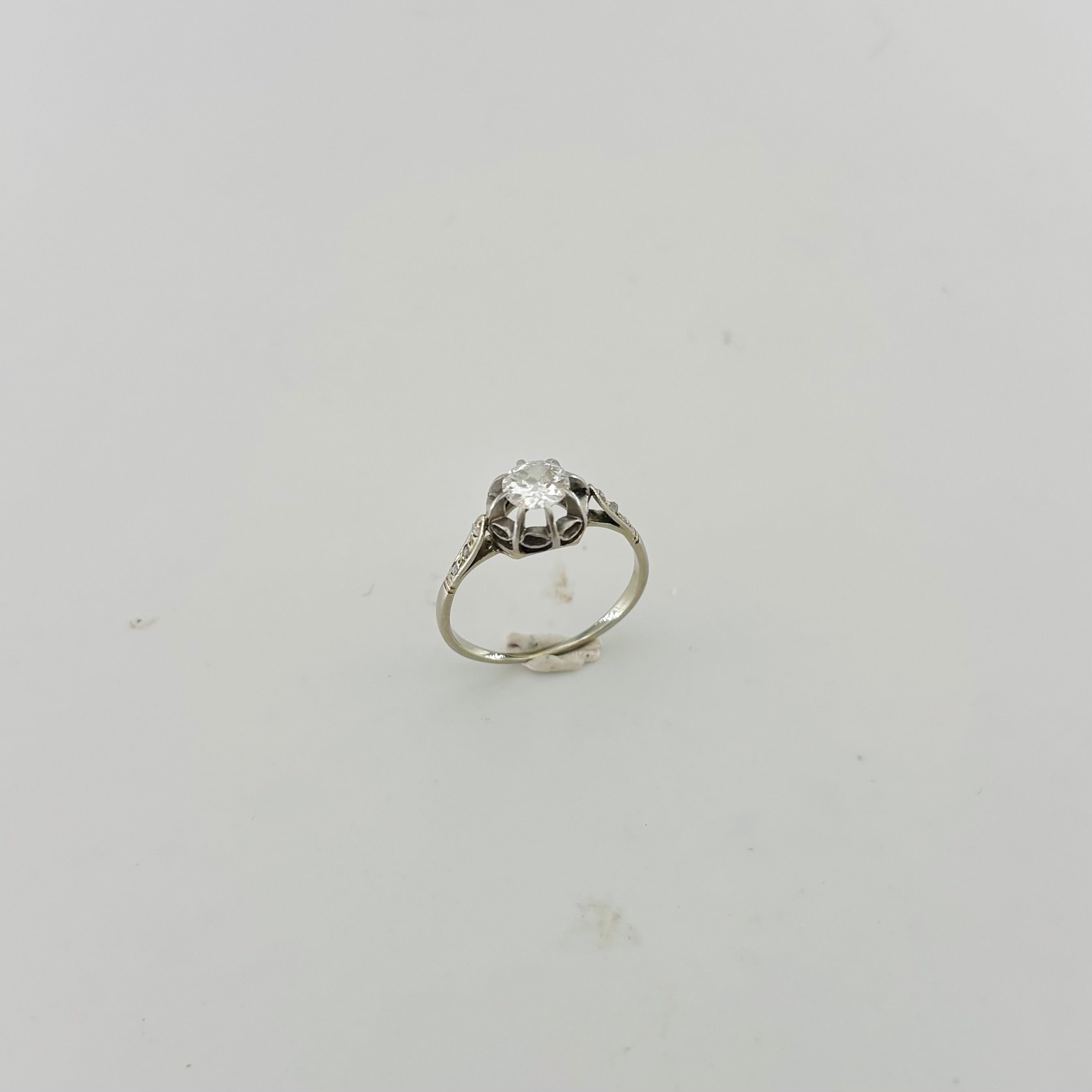 Solitaire Ring in White Gold, Platinum, and Diamonds