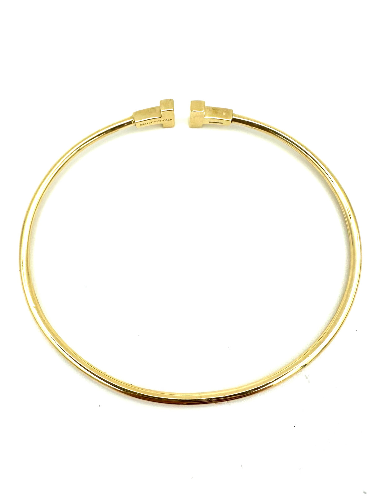 TIFFANY & CO. "Tiffany T" Yellow Gold Bangle Bracelet