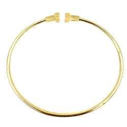 TIFFANY & CO. "Tiffany T" Yellow Gold Bangle