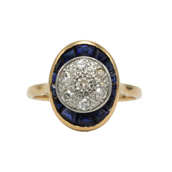 Ring in yellow gold, platinum, sapphires, and diamonds