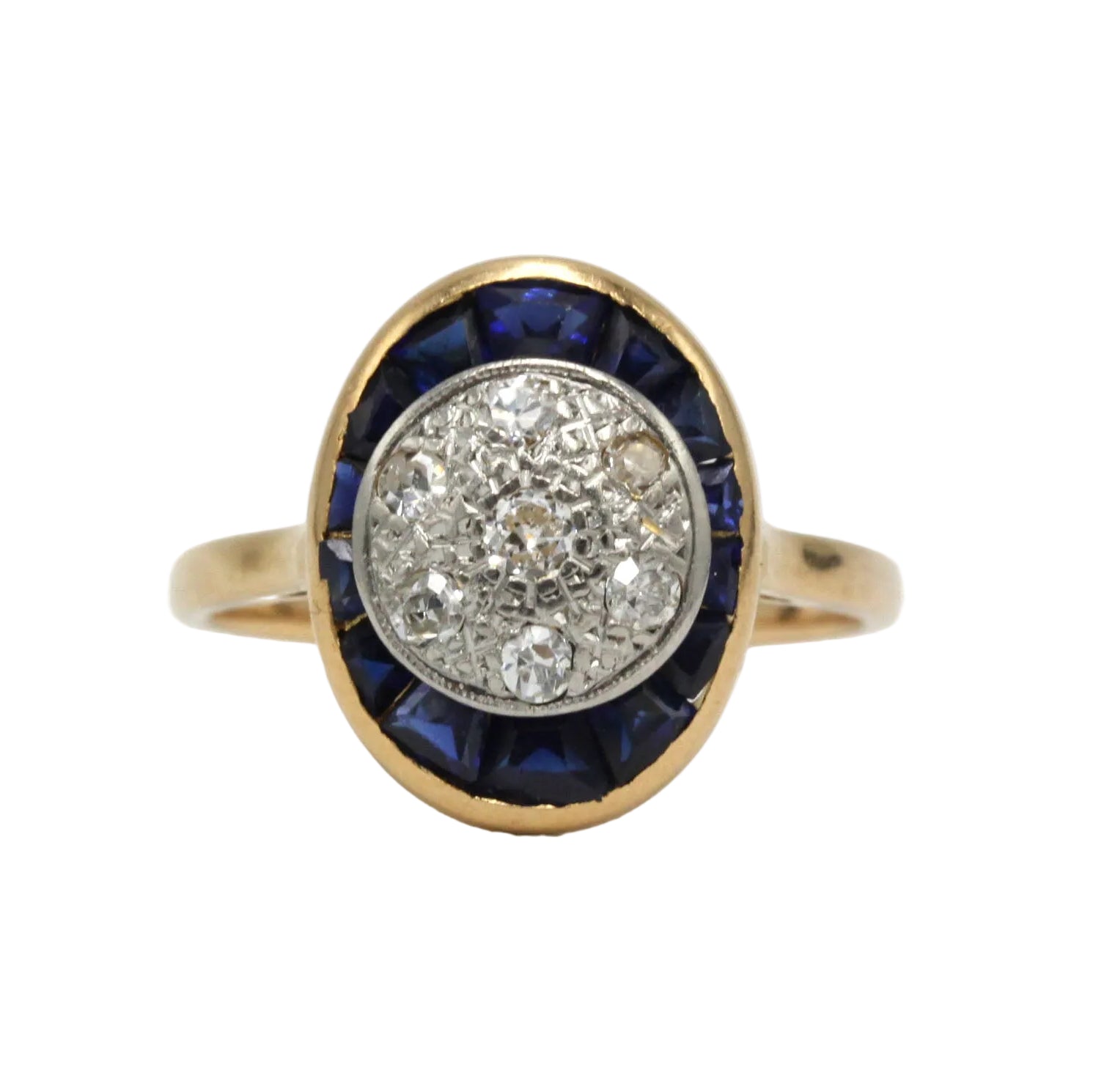 Ring in yellow gold, platinum, sapphires, and diamonds