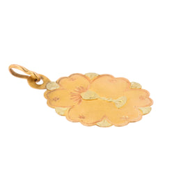 Rose gold and green gold medal