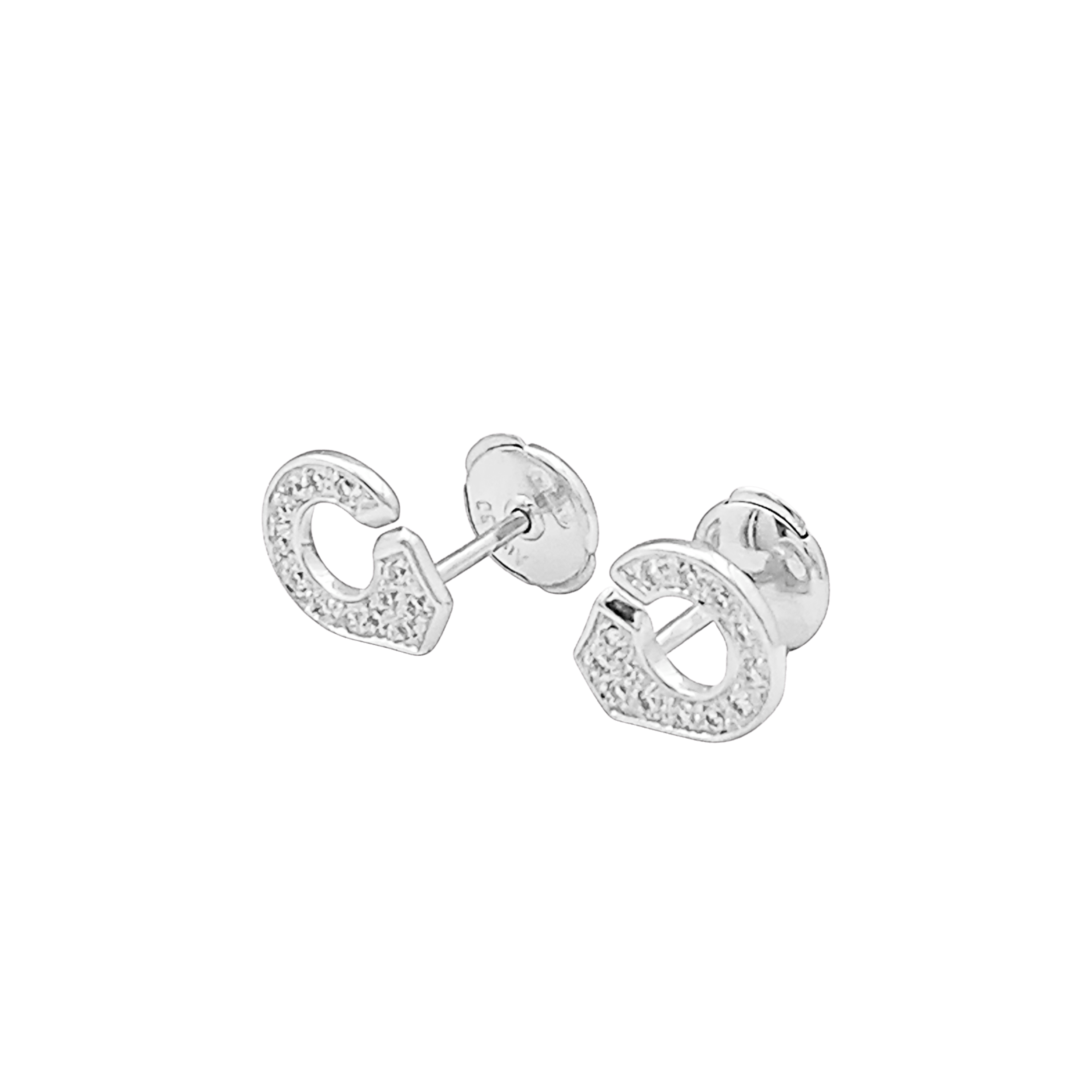 Puces d'oreilles Dinh Van, "Menottes" or blanc et diamants.
