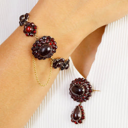 Yellow gold, silver, and garnet bracelet