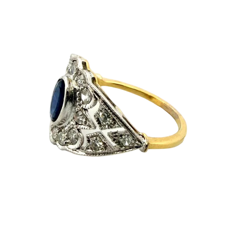 Entourage Ring in white gold, yellow gold, sapphire, and diamonds