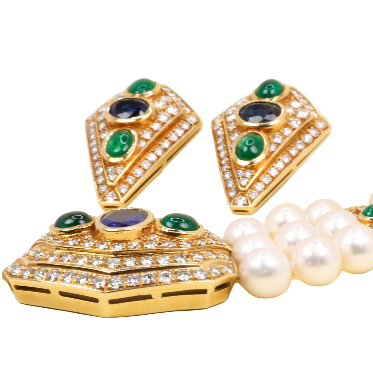 REPOSSI set in yellow gold, with pearls, sapphires, emeralds, and diamonds