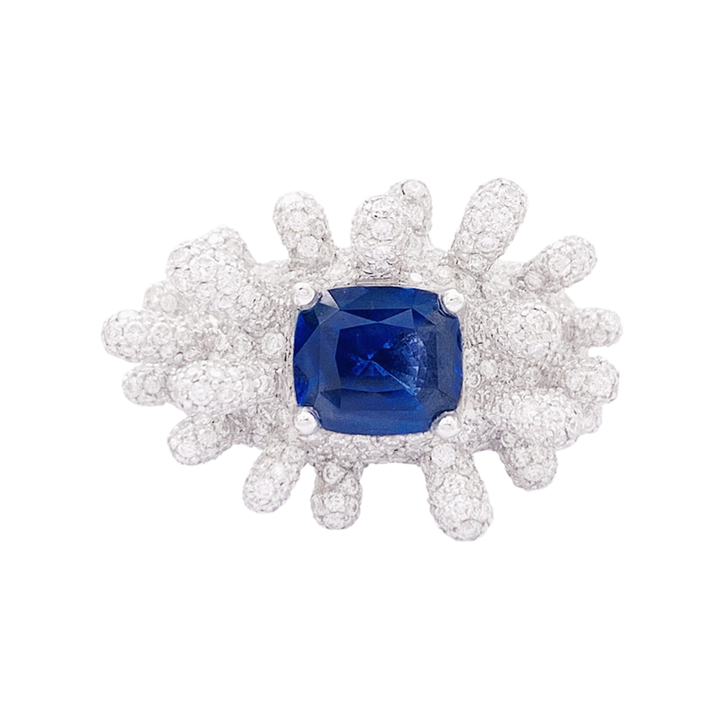 Bague Manalys en or blanc, diamants et saphir.