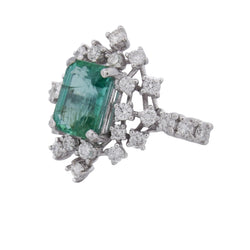 "Entourage" Ring in White Gold, Emerald, and Diamonds