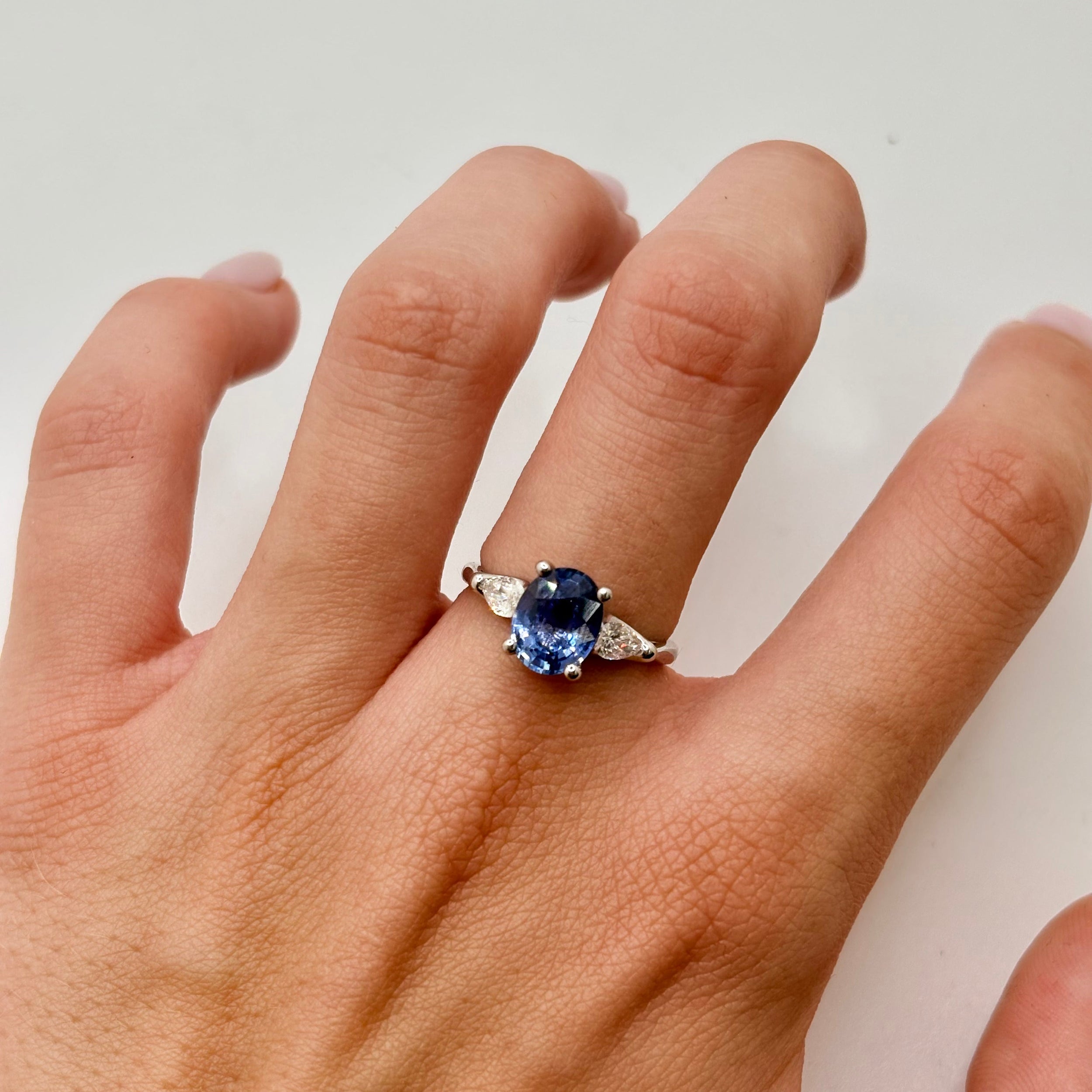 Trilogy Ring in White Gold, Sapphire, and Diamonds