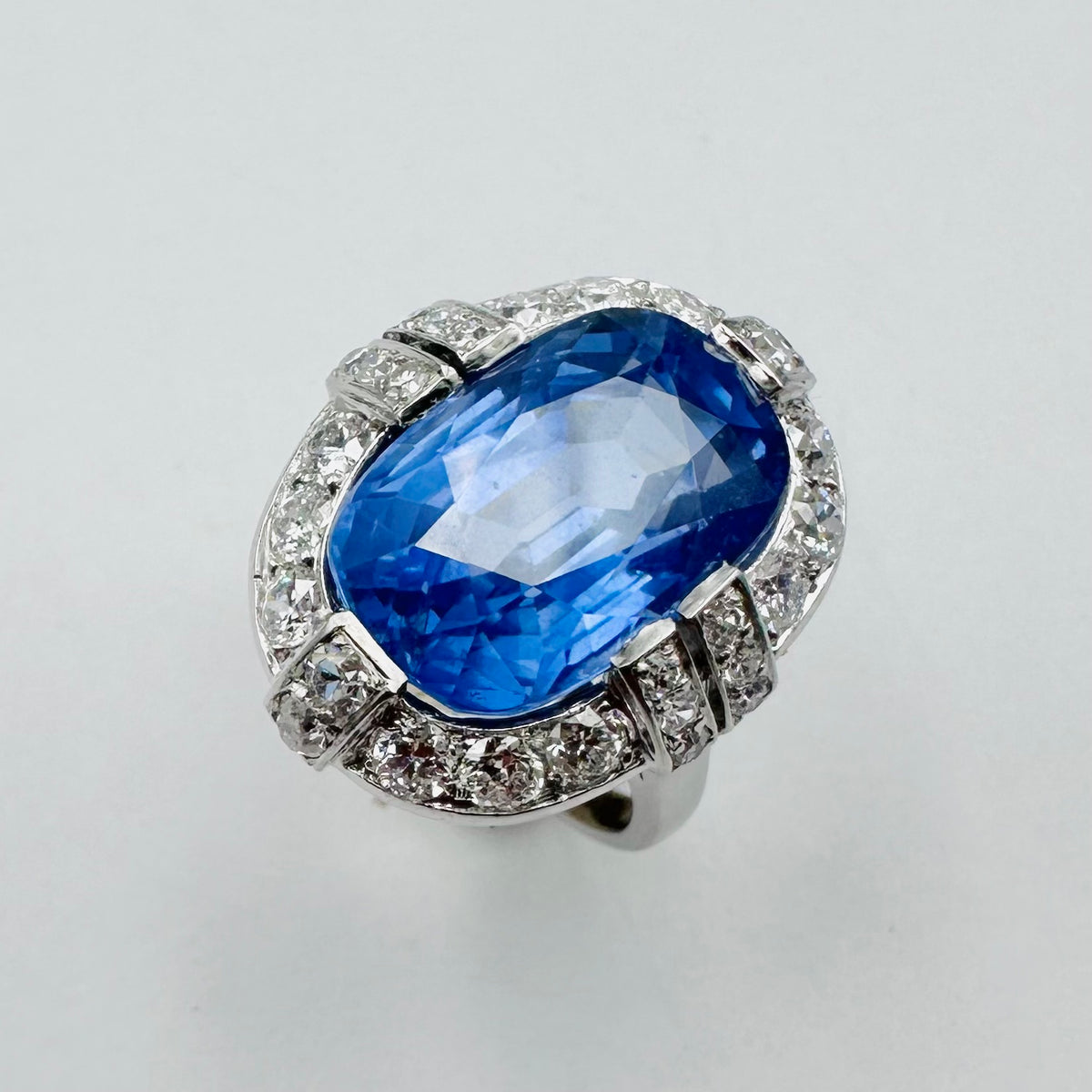 Entourage Ring in platinum, sapphire, and diamonds