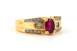 Yellow gold ring with rubies and diamonds