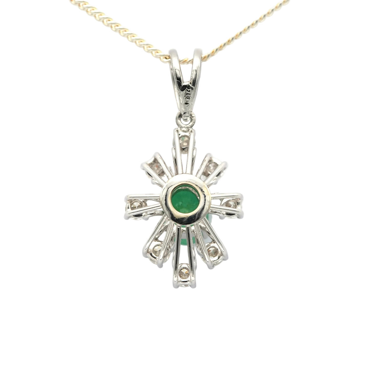 White gold pendant with emeralds and diamonds