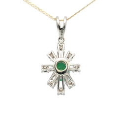 White gold pendant with emeralds and diamonds