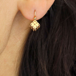 Single rose gold lever-back earring
