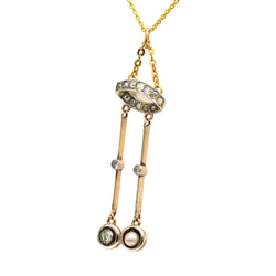 Pendentif en or jaune, perle et diamants