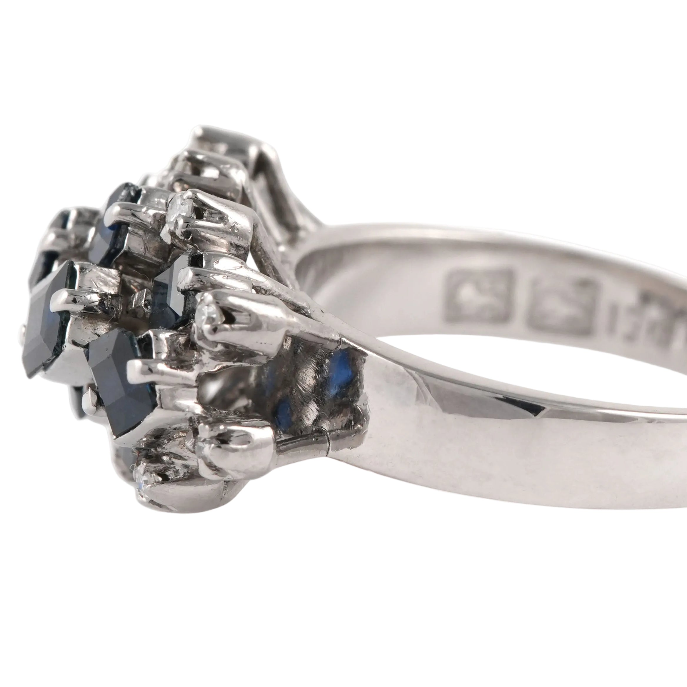 White gold ring with sapphires and diamonds