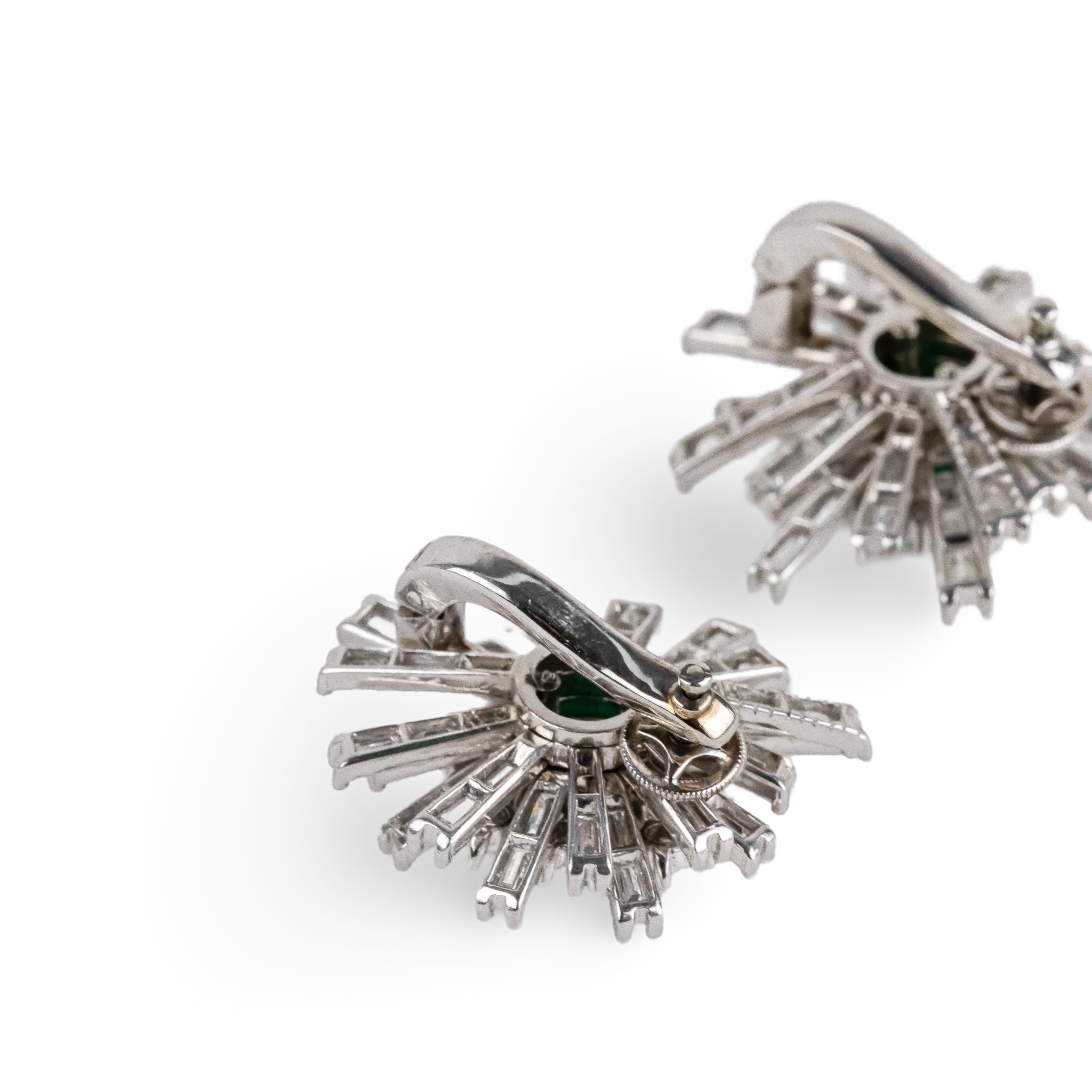 Clip-on earrings in white gold, platinum, Colombian emeralds, and diamonds