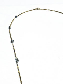 Rose gold long necklace with Tahitian pearls.