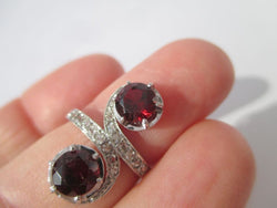"Toi et Moi" Ring with 19th-Century Swirls, Garnets, Diamonds, and Platinum