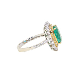Entourage Ring in white gold, yellow gold, Emerald, and Diamonds