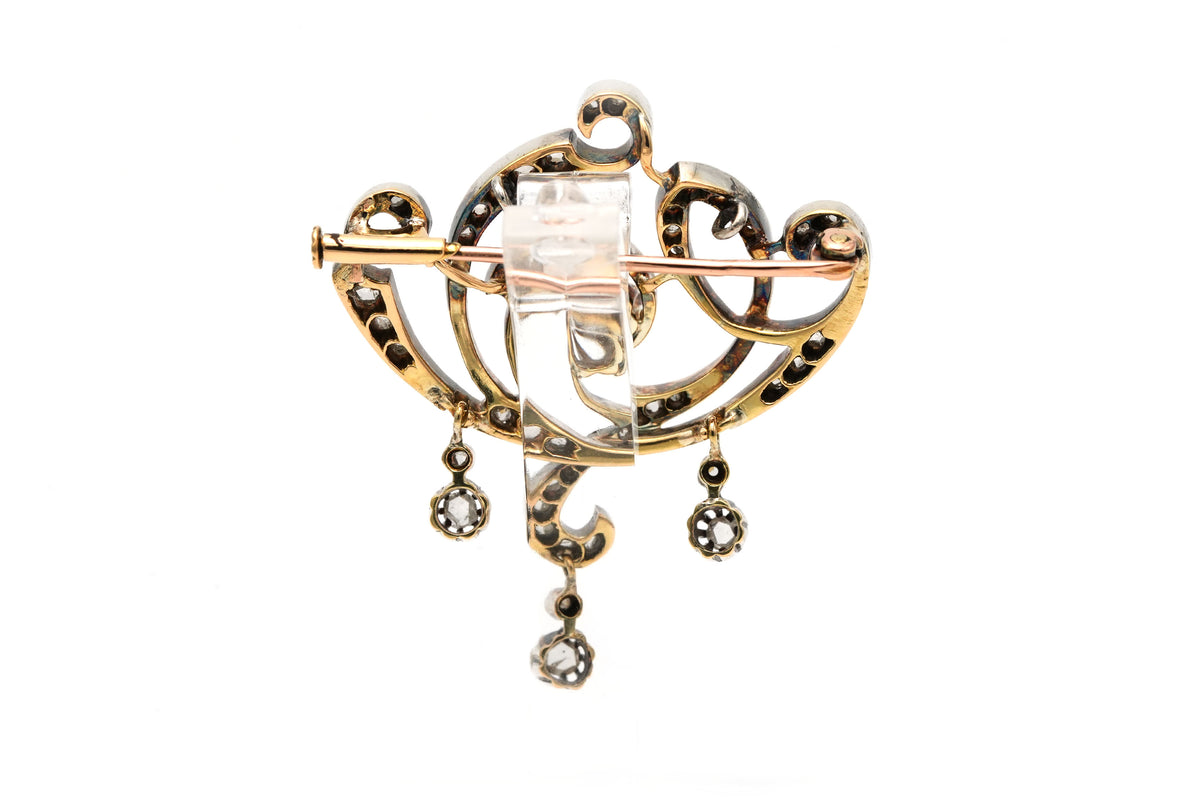 Broche Épingle en or jaune, argent et diamants