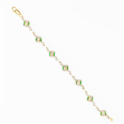 Art Deco bracelet in yellow gold, platinum, pearls, emeralds, and diamonds