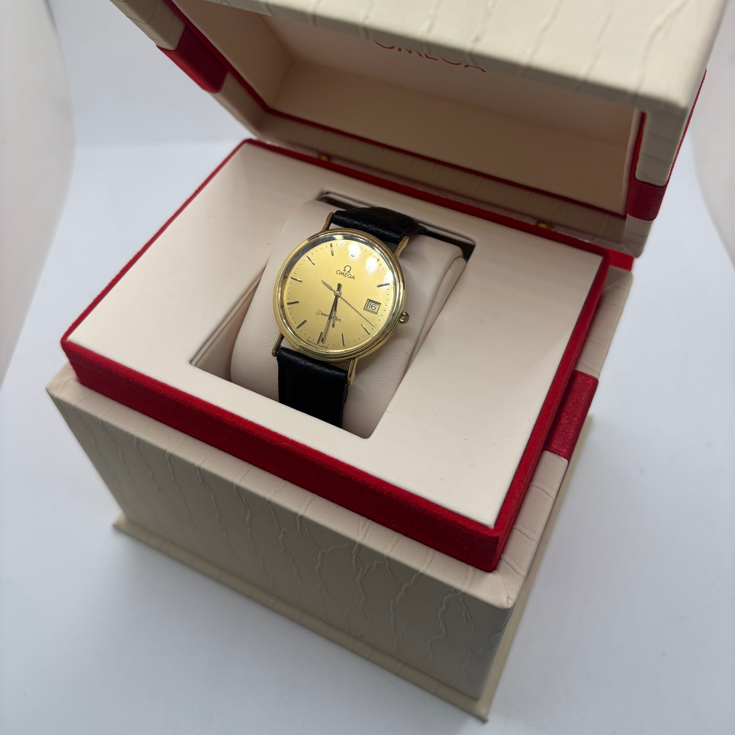 OMEGA "Seamaster" Watch in Yellow gold and Leather