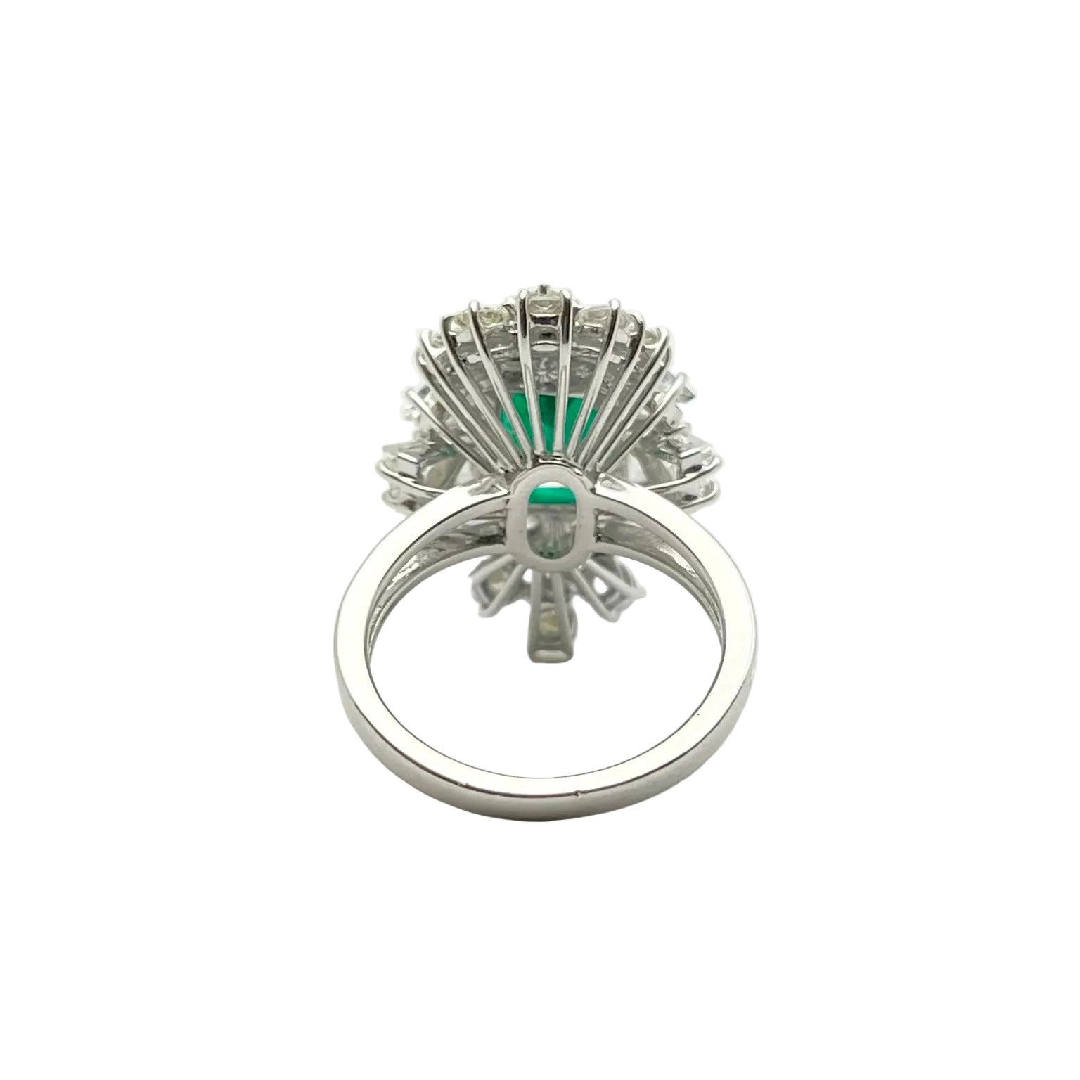 Entourage Ring in white gold, Emerald, and Diamonds