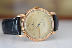 ROLEX "Chronometer" watch in rose gold, steel, and leather