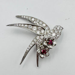 Brooch "Bird on two flowers" in white gold and Platinum