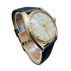 ROLEX "Oyster Perpetual 34" watch in yellow gold and leather