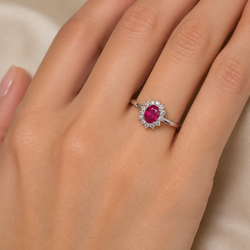 Entourage Ring in white gold, rubies, and diamonds