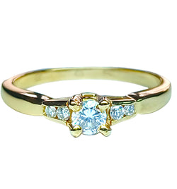 Yellow Gold Solitaire Ring with Diamonds