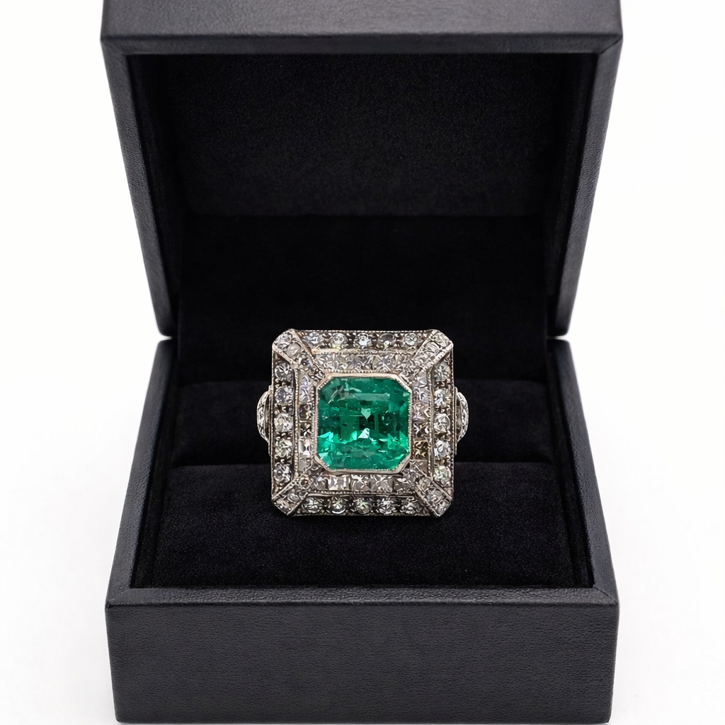 Cocktail Ring in White Gold, Emerald, and Diamonds