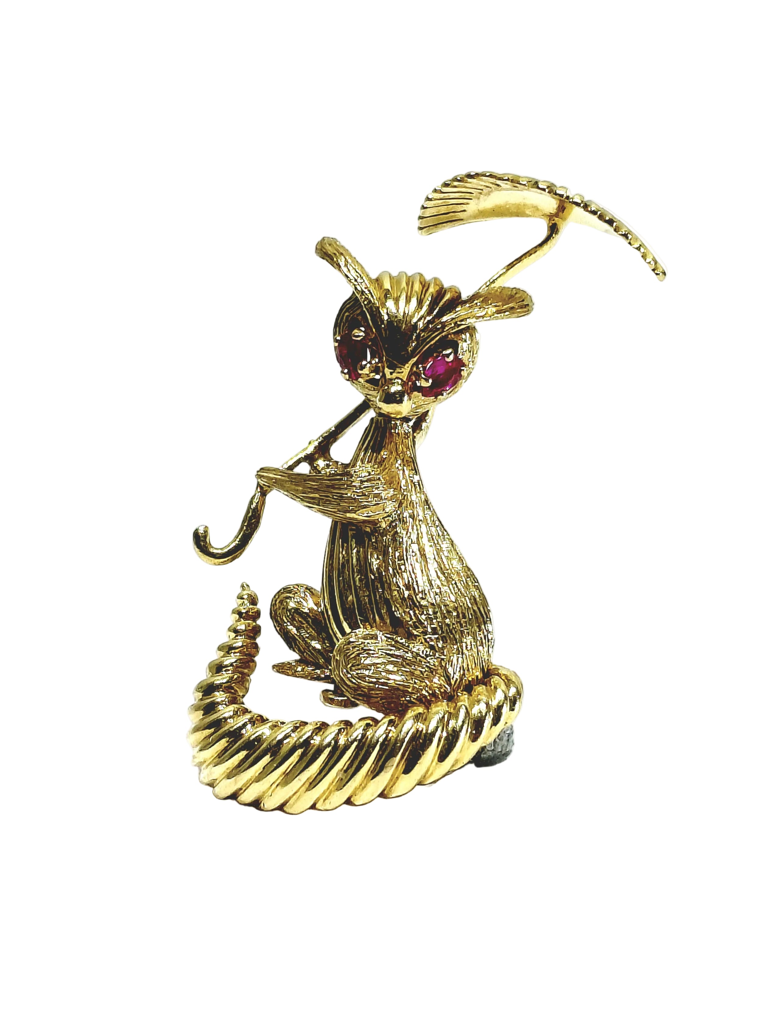 Champagne-colored gold and Ruby brooch