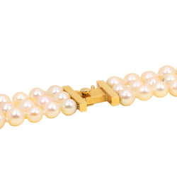 REPOSSI set in yellow gold, with pearls, sapphires, emeralds, and diamonds
