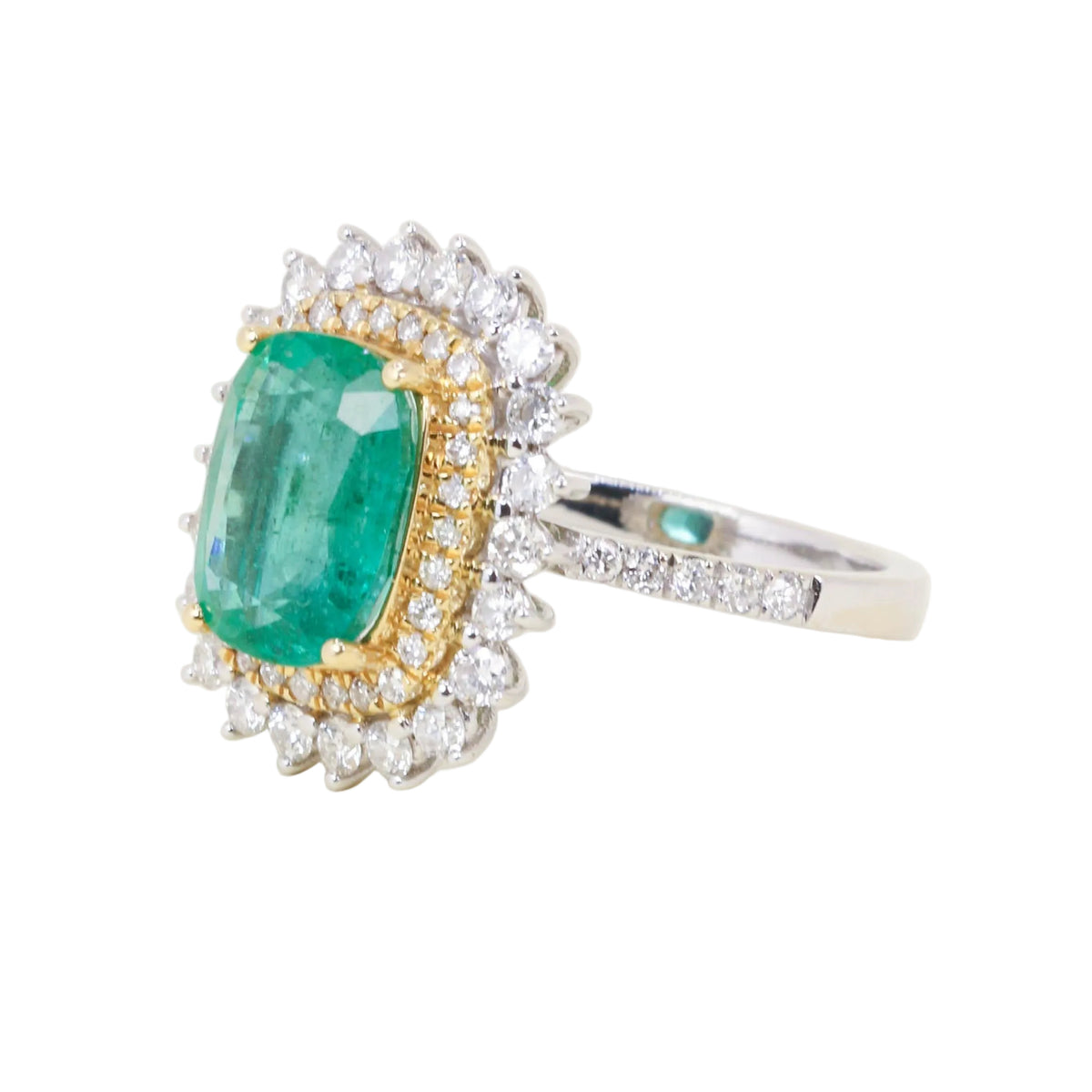 Entourage Ring in white gold, yellow gold, Emerald, and Diamonds