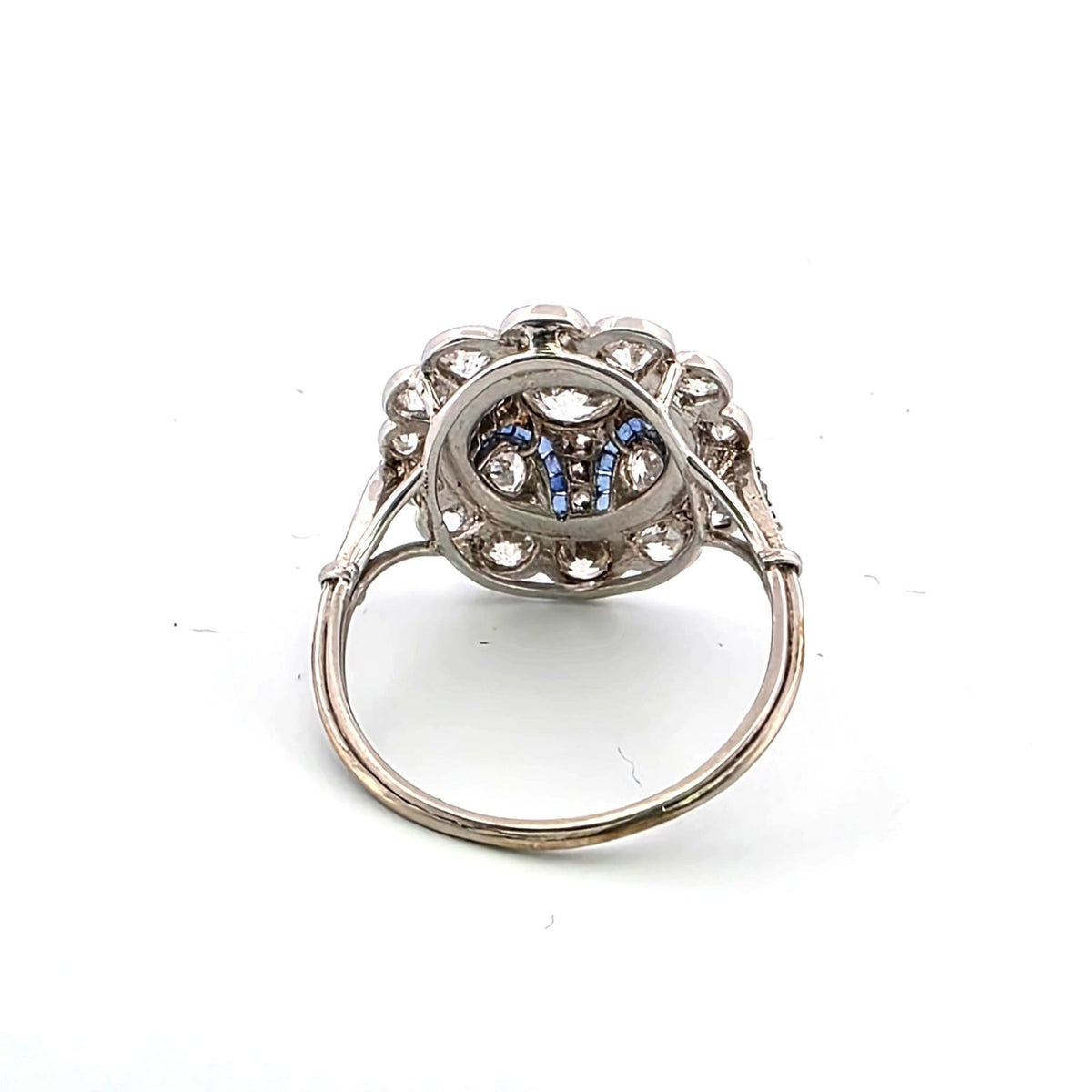 Entourage Ring in platinum, sapphires, and diamonds
