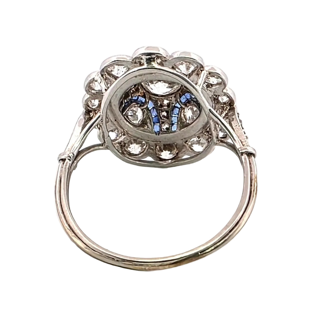 Entourage Ring in platinum, sapphires, and diamonds