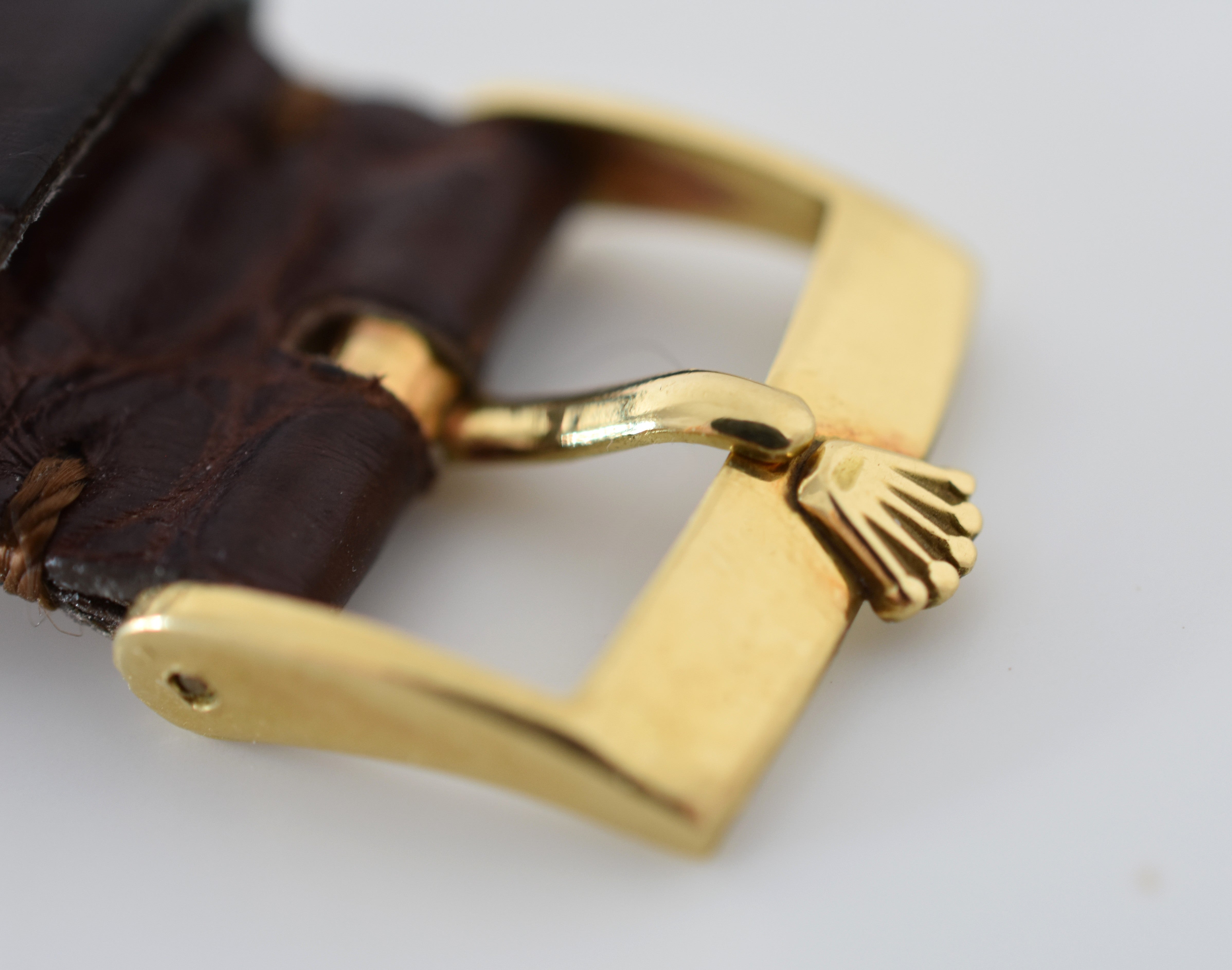 ROLEX "Oyster Perpetual Date Ovettone" watch in yellow gold and leather