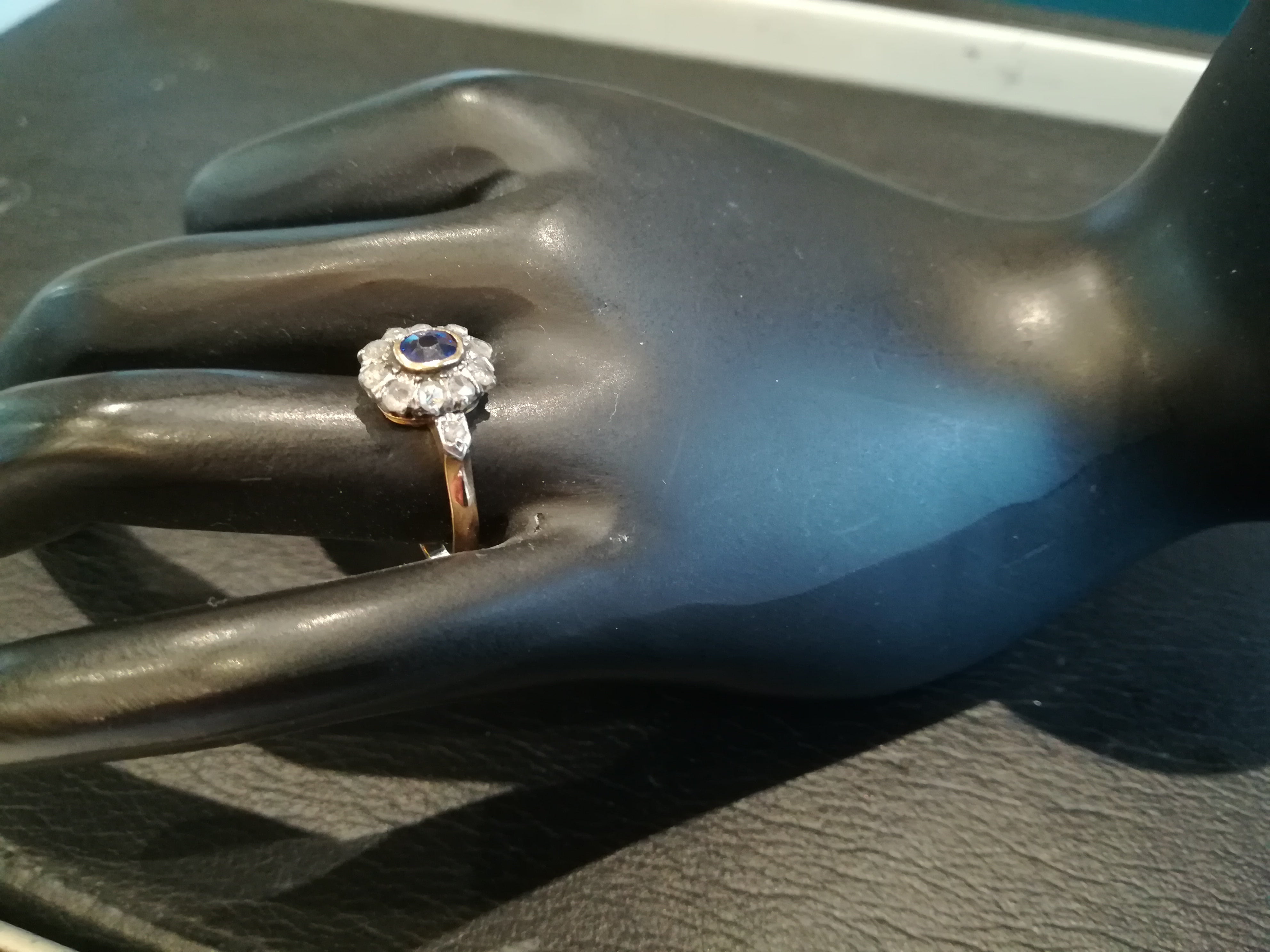 Ring in pink, paltinium, sapphire and diamonds.