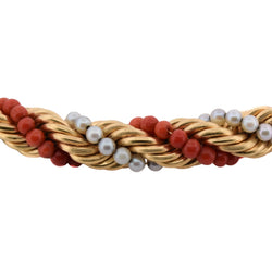 Set of jewelry in yellow gold, coral, and pearls