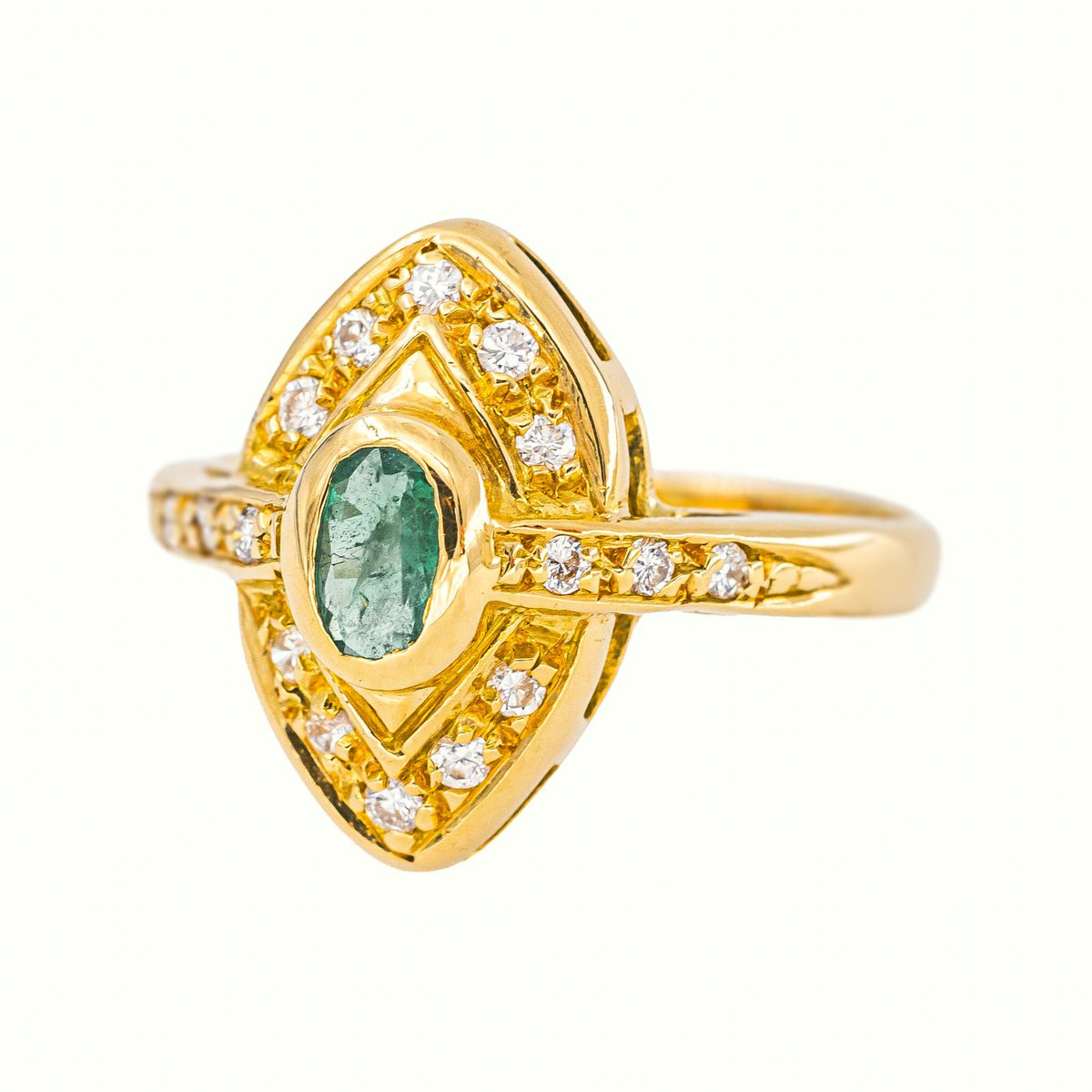 Marquise Ring in Yellow Gold with an Emerald