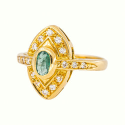 Marquise Ring in Yellow Gold with an Emerald