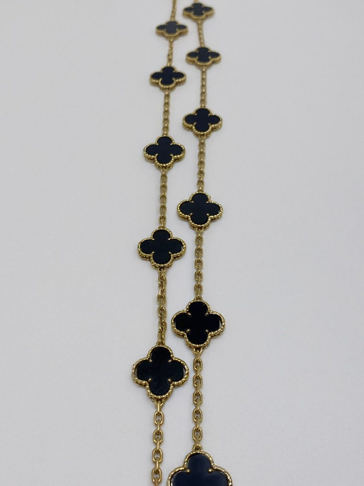 VAN CLEEF & ARPELS "Vintage Alhambra" Long necklace in yellow gold and Onyx