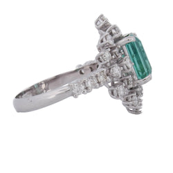 "Entourage" Ring in White Gold, Emerald, and Diamonds