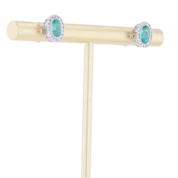 Boucles d'oreilles Puces en or blanc, émeraudes et diamants